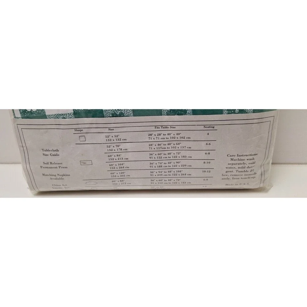 New In Package, 1980s Vinyl Flannel Back Green Gingham 60x84 Oval Tablecloth-USA